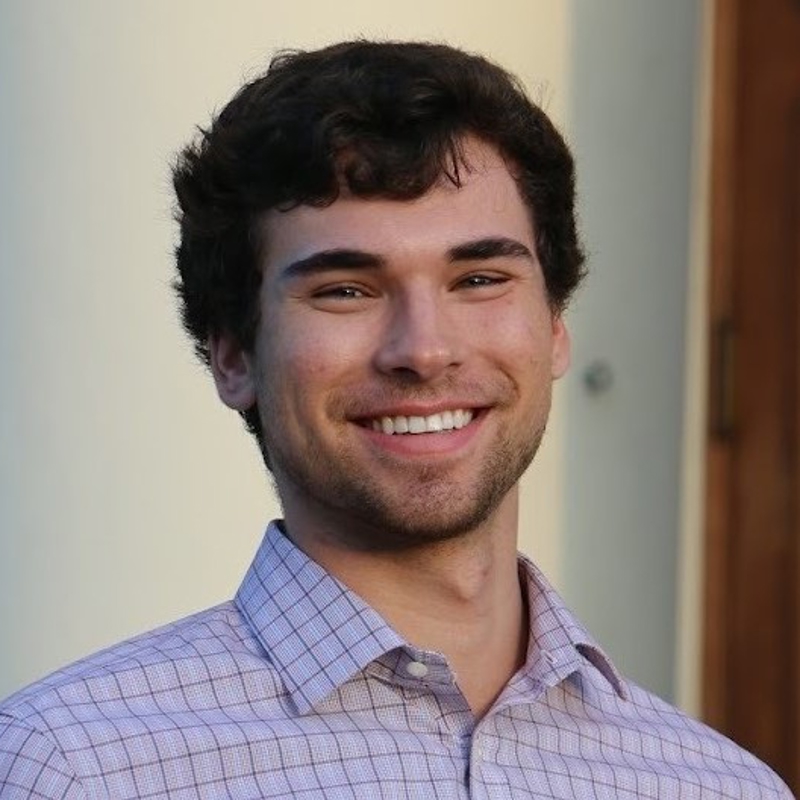 a person smiling at the camera