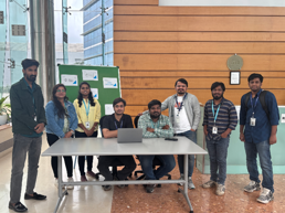 a group of people posing for a photo