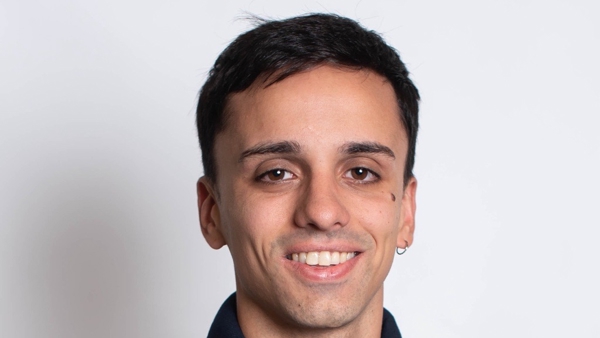 a person smiling for a picture