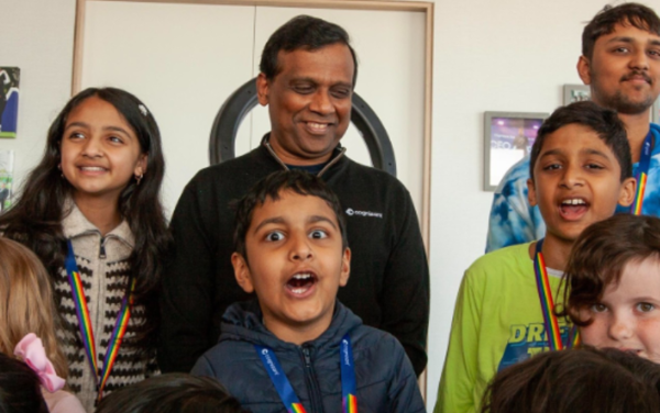 a group of kids with medals around their neck