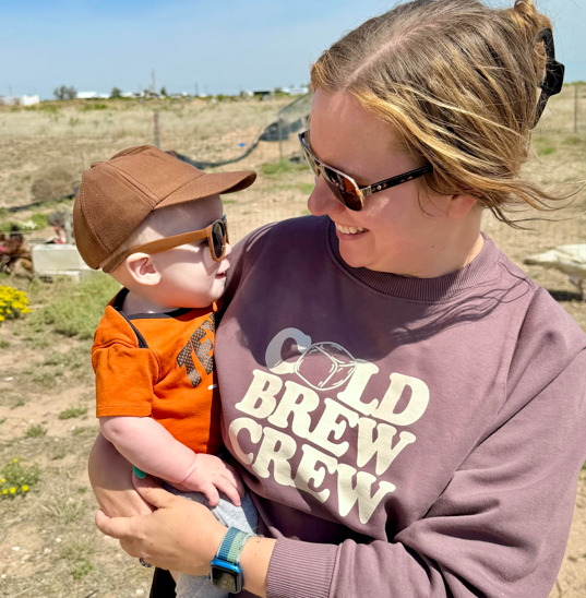 a person holding a baby