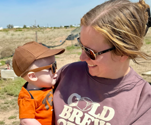 a person holding a baby