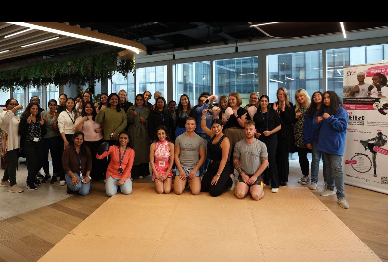 a group of people posing for a photo