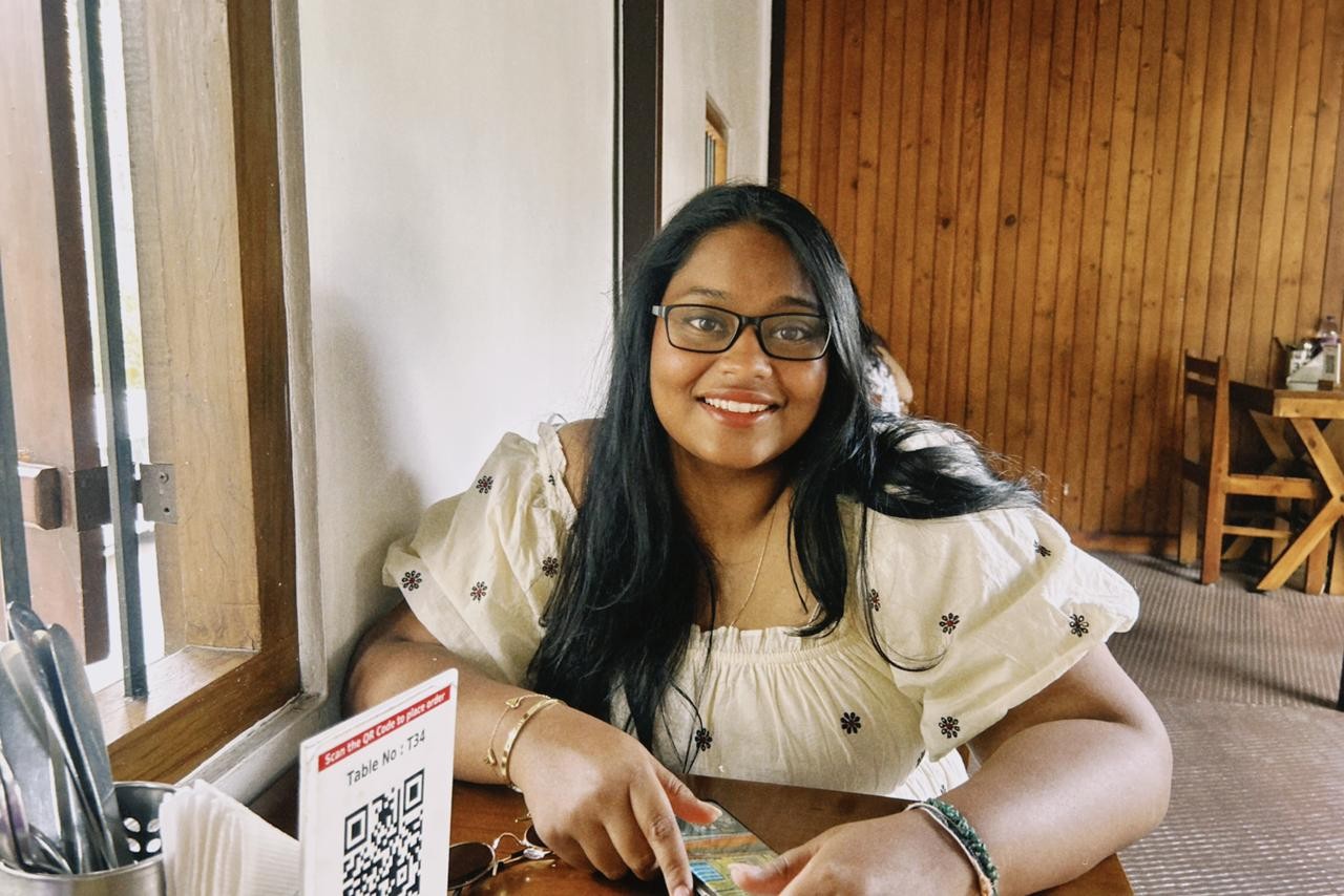 a person sitting at a table