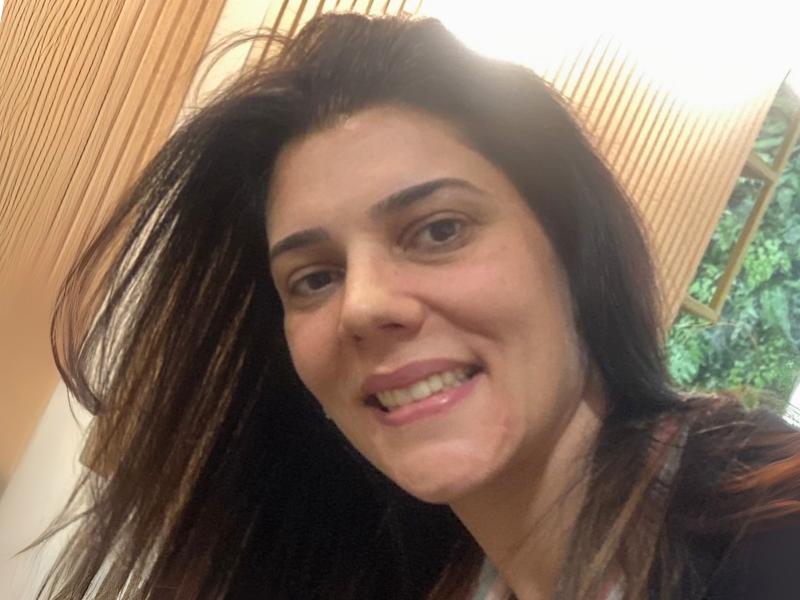 a person smiling for the camera