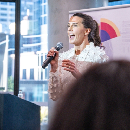 a person speaking into a microphone