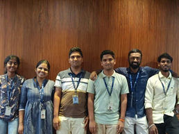 a group of people posing for a photo