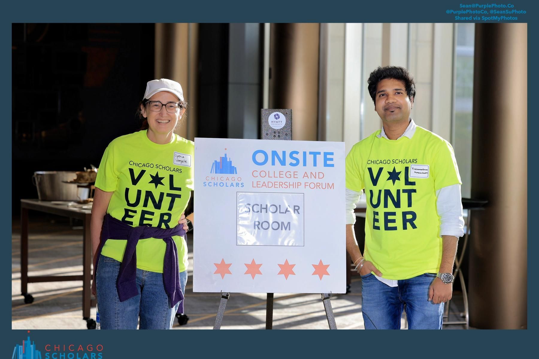a person and person standing next to a sign