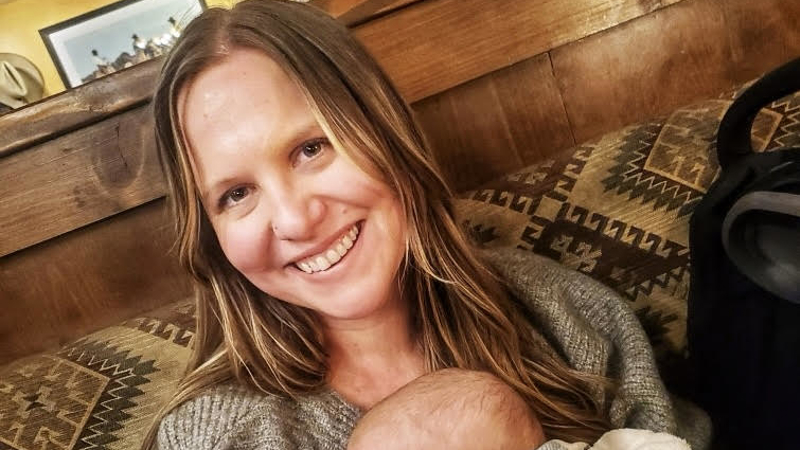 a person holding a baby