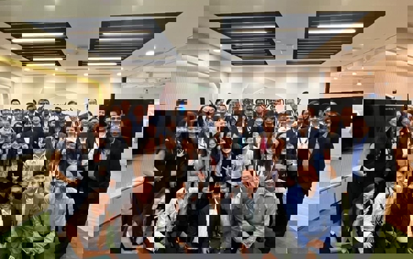 a group of people posing for a photo