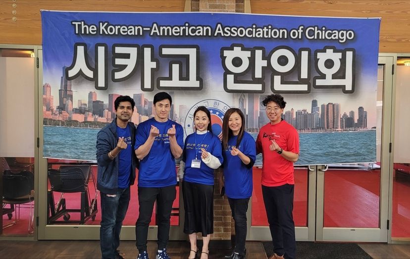 a group of people posing for a photo