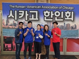 a group of people posing for a photo