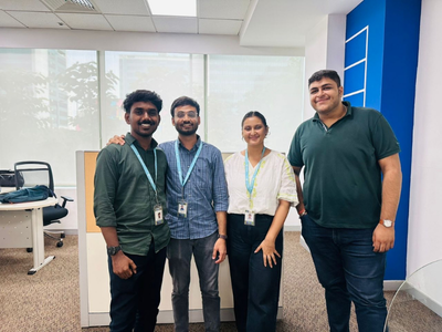 Gnandeep (to the far left) with fellow interns in the office