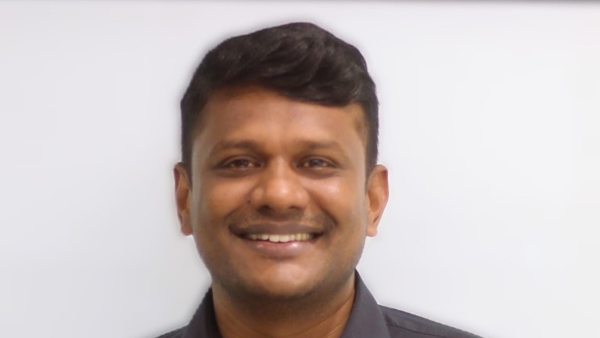 a person smiling for a picture