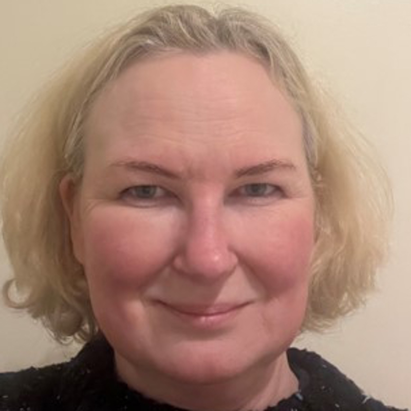 a person smiling for the camera