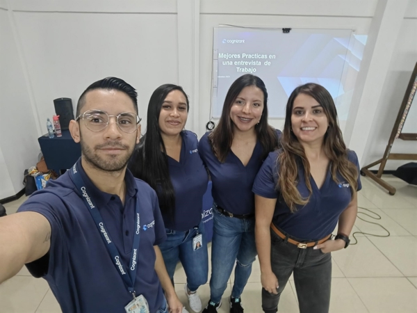 a group of people posing for a photo