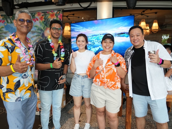 a group of people posing for a photo