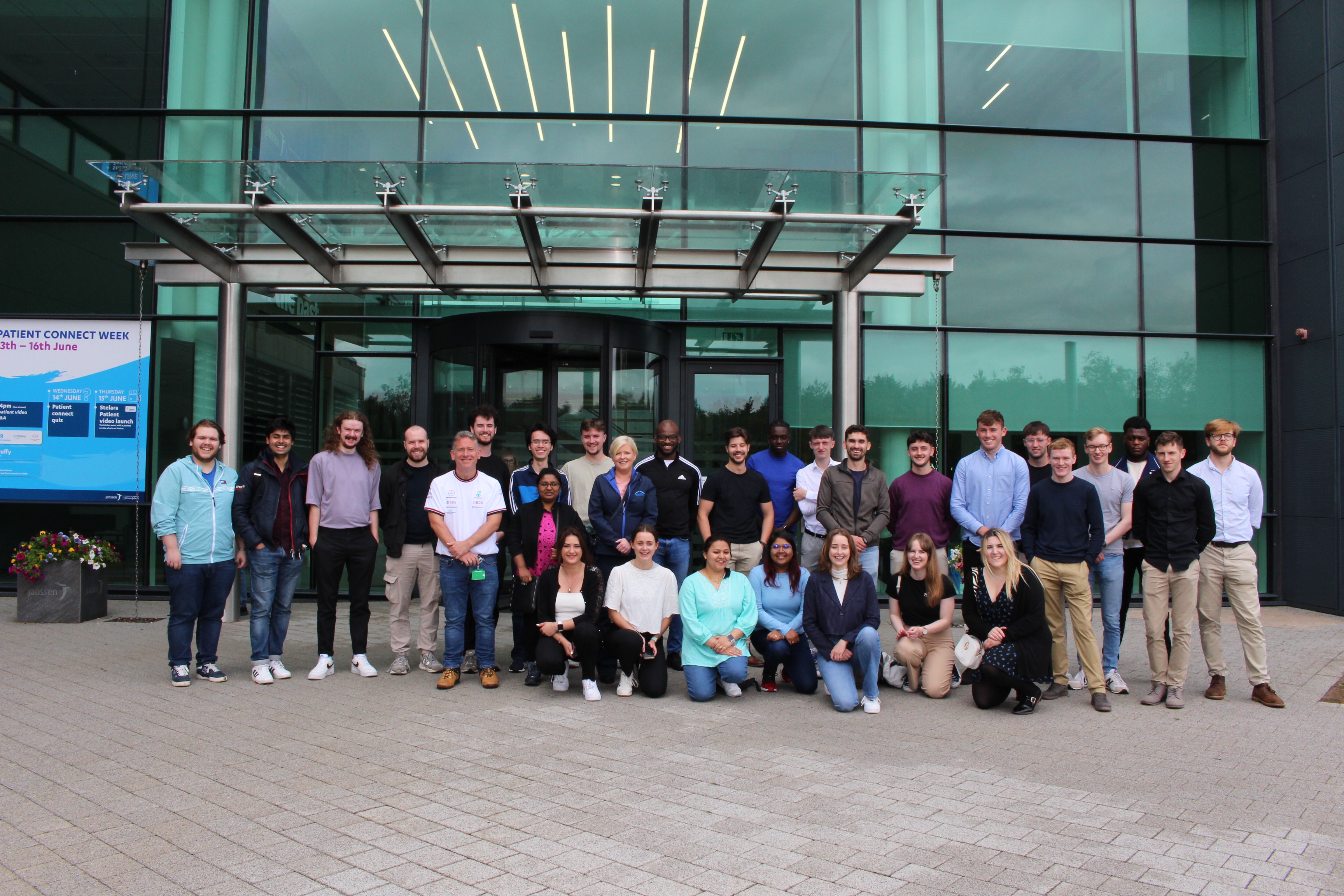 a group of people posing for a photo