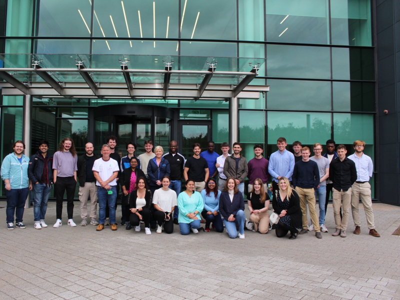 a group of people posing for a photo
