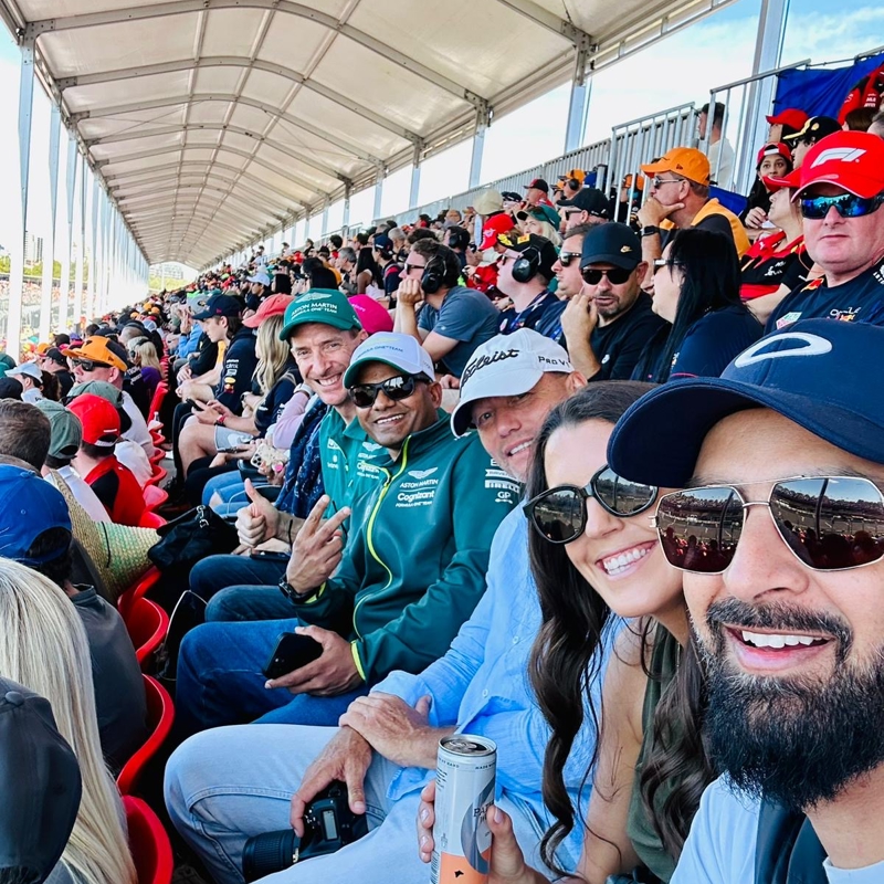 a group of people sitting in a stadium