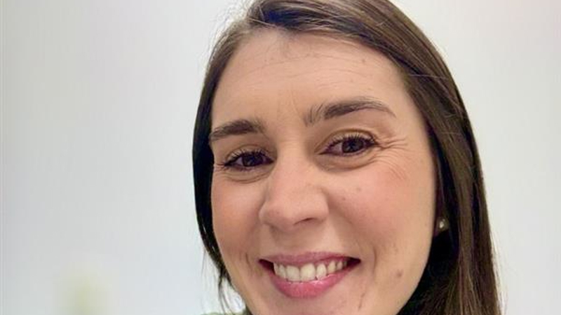 a person smiling at the camera