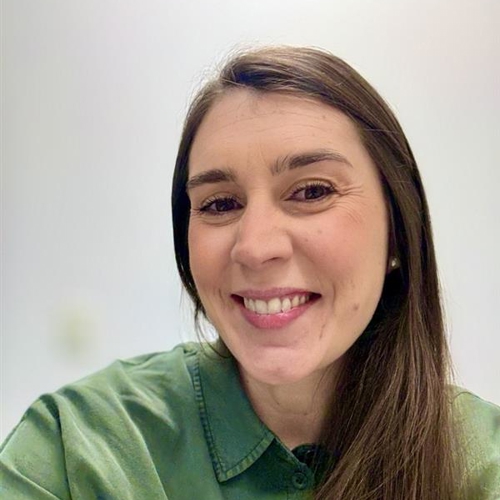 a person smiling at the camera