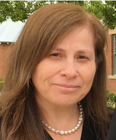 a person smiling for a picture