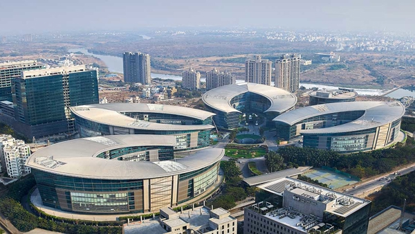 a group of buildings with curved roofs