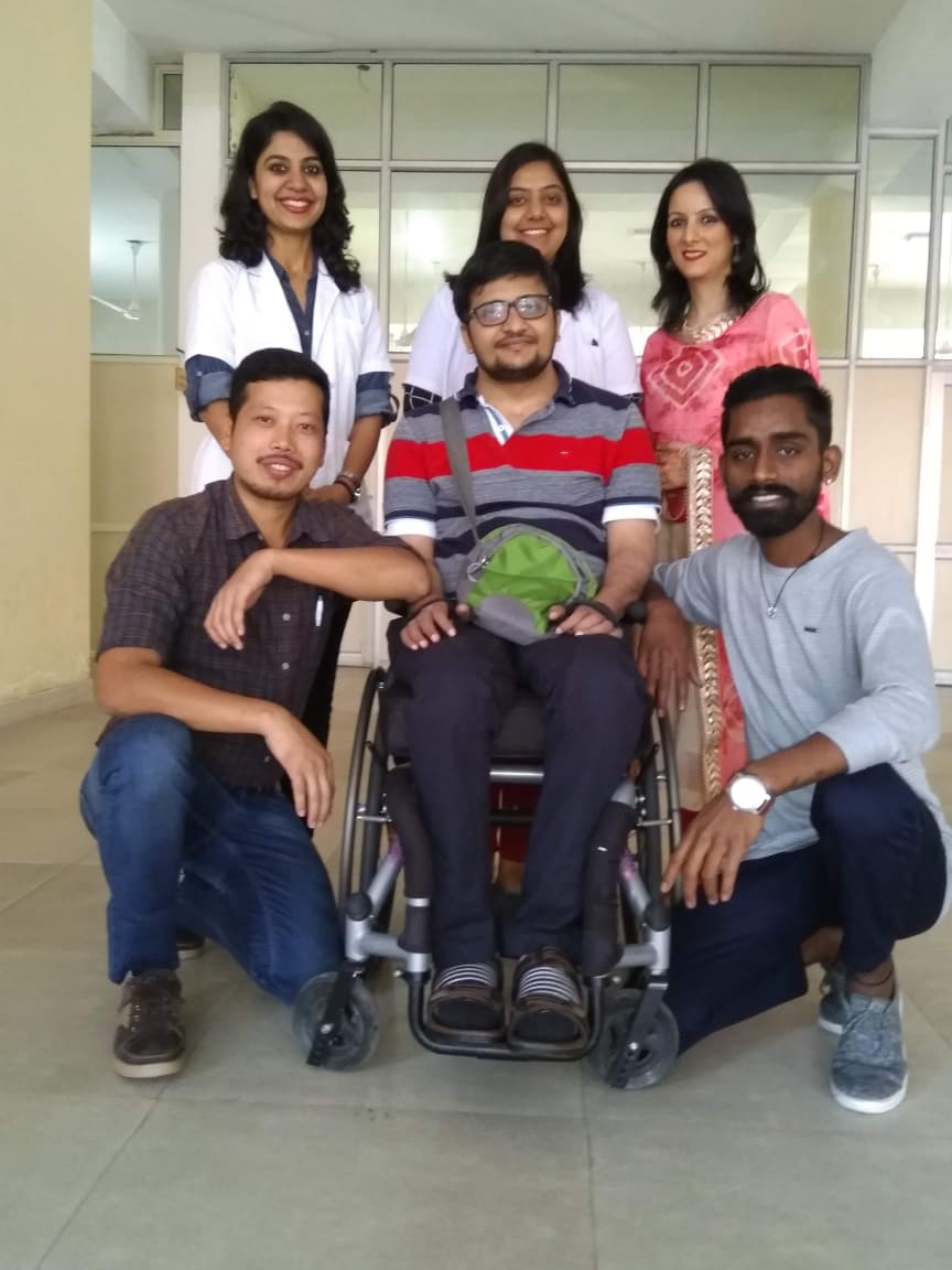 a group of people posing for a photo