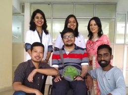 a group of people posing for a photo