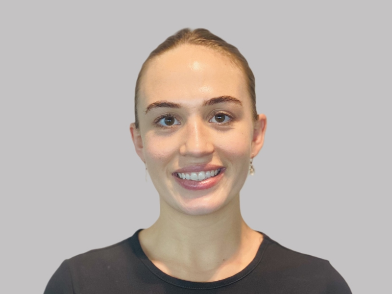 a person smiling at the camera