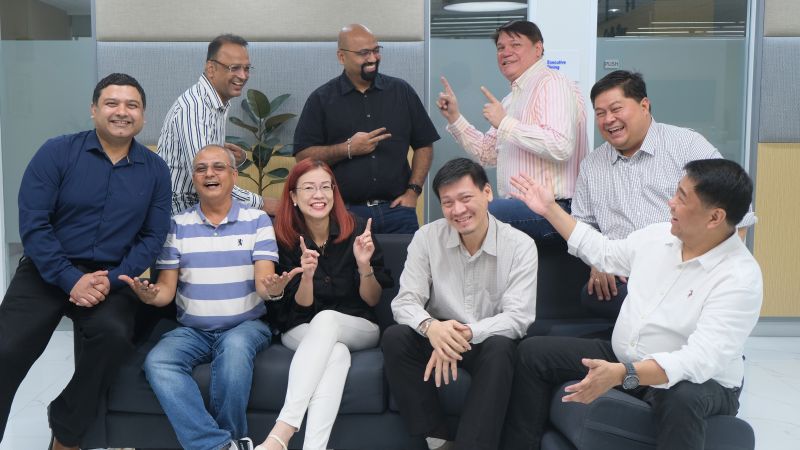 a group of people sitting on a couch