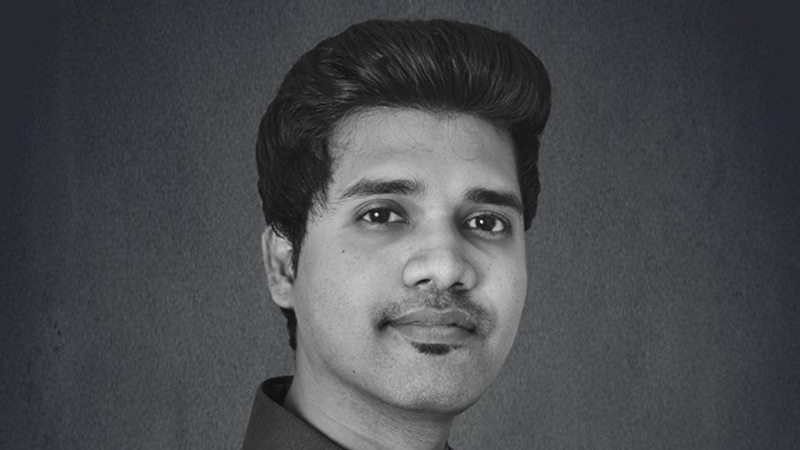 a person with a mustache and beard