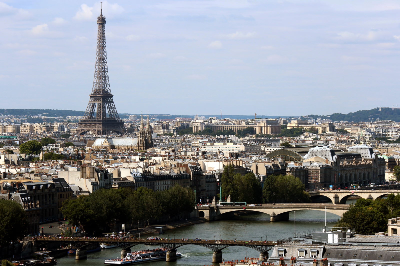 a city with a bridge and a tower