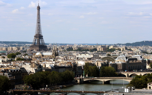 a city with a bridge and a tower