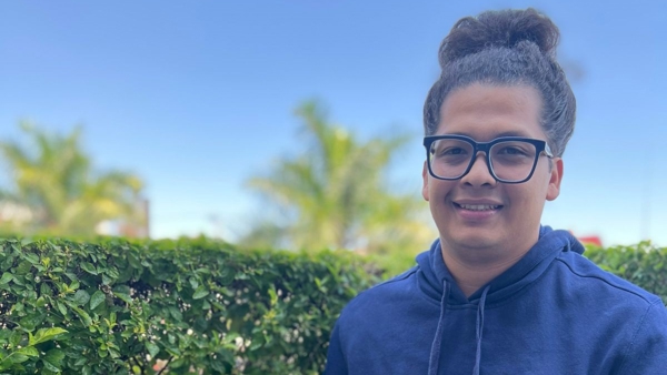 a person in a blue sweatshirt