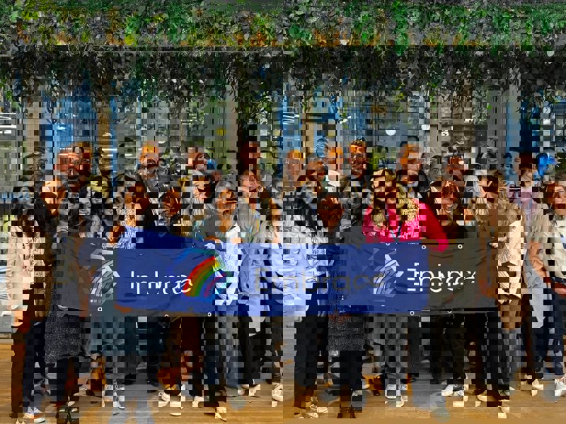 a group of people posing for a photo